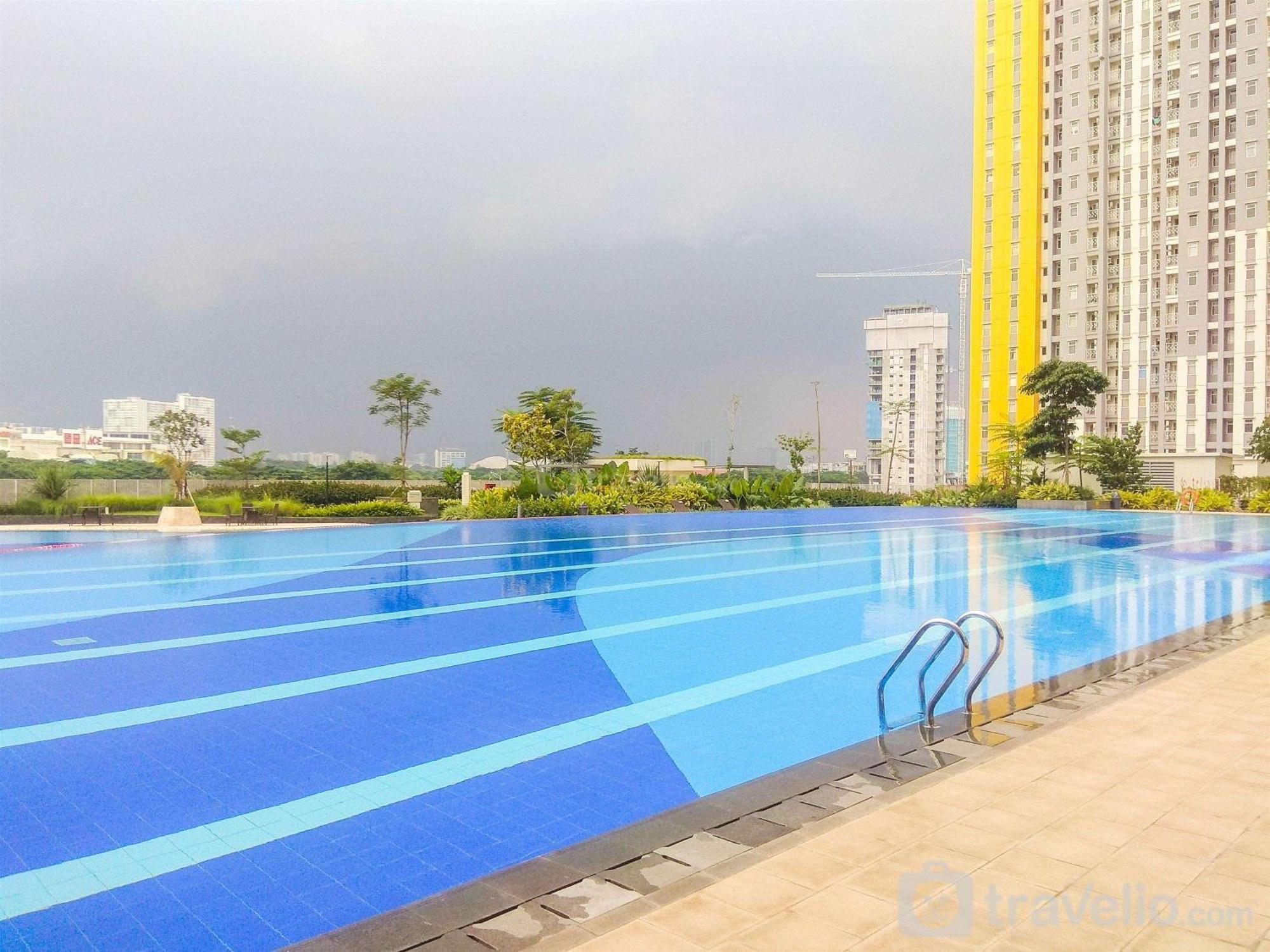 With Pool View Springlake Summarecon By Travelio Bekasi