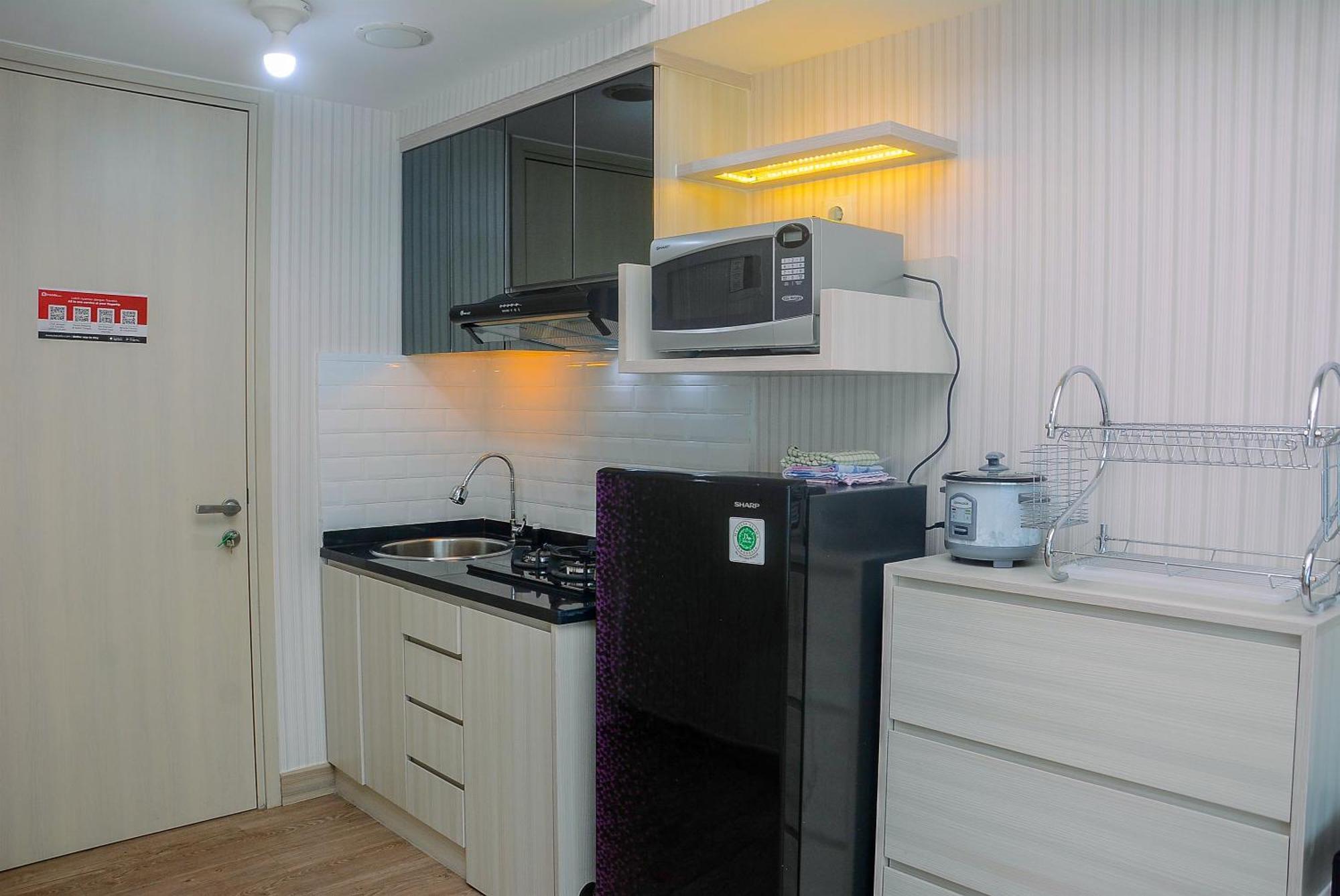 Apartemen With Pool View Springlake Summarecon By Travelio